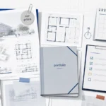Projet de concours non primé transformé en dossier portfolio sur une table d’architecture
